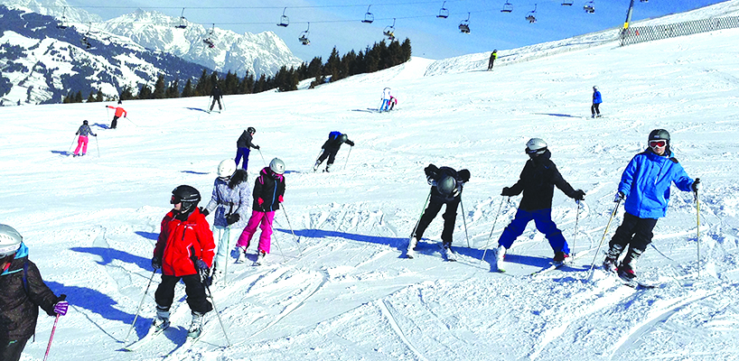 Photo of GHS students skiing on a mountain